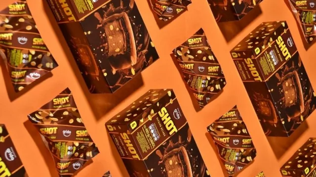 Alianza de gigantes: la capacidad de producción de Helacor y Shot, una marca emblema de Mondelez
