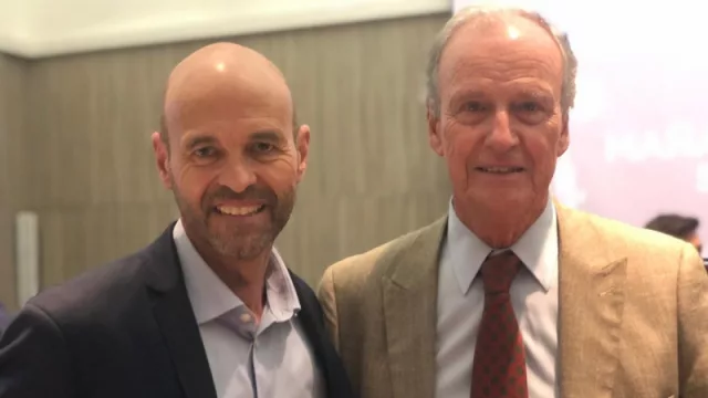 Guillermo Dietrich (ministro de Transporte) y Manuel Tagle (presidente de la Bolsa de Córdoba): ex competidores en la venta de autos, en sintonía política.