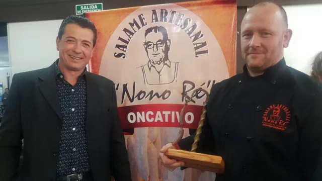 Gustavo Ochetti, presidente del Club Unión (sede de la Fiesta Nacional) y Cristian Berardo, Rey del Salame 2018