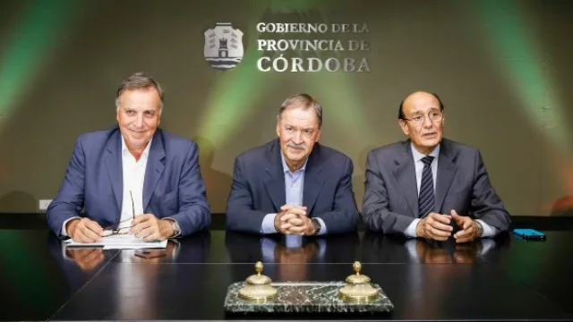 Daniel Tillard, Juan Schiaretti y Oscar González.