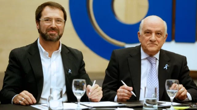 El director de Negocios Corporativos de Telecom, Gustavo Vidal y el titular de CAME, Fabián Tarrio.