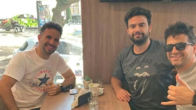 2 de los socios y el oficial Gordillo