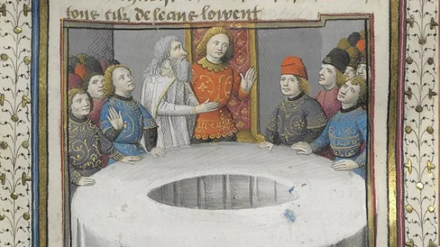 La mesa con un hueco al medio en un manuscrito de la Edad Media.