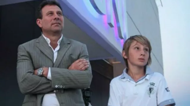 Roque Lenti, socio, junto a su hijo.