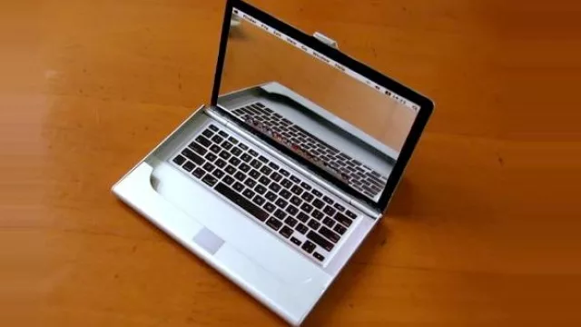 Tarjetero con forma de notebook.