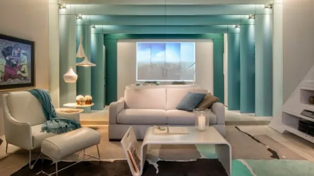 Paneles creados en la gama del esmeralda para darle profundidad y amplitud a los ambientes.