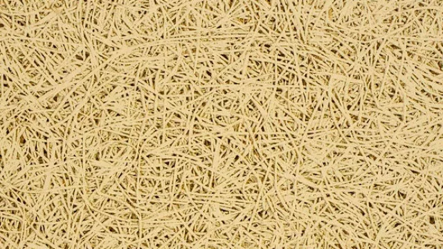 Un primer plano de lo que es las placas de lana de madera.