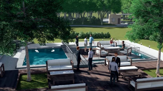 Las piletas y área de distensión superpuestas conviven en el jardín.