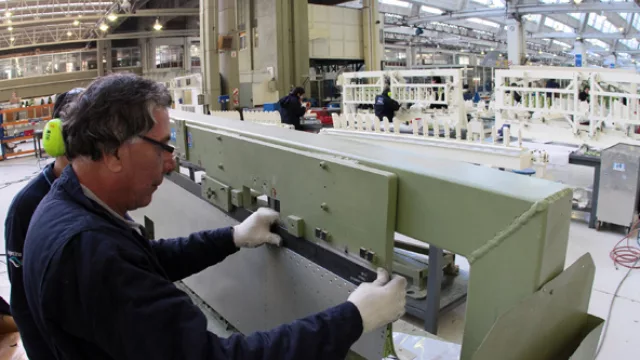 Los trabajadores de la línea de producción del Pampa III.