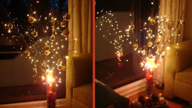 Árbol luminoso realizado con ramas secas de sauce eléctrico, un florero, borlas y luces de navidad.