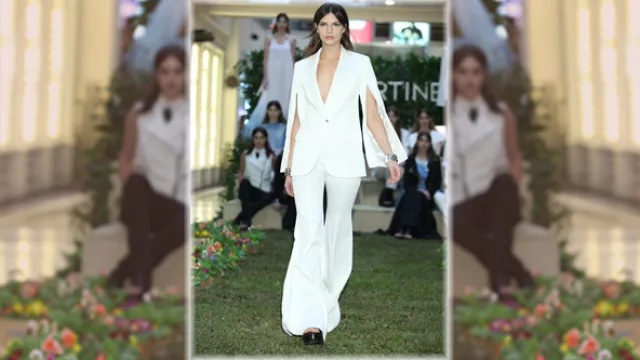 Allo Martinez;  traje sastrero en blanco tiza, con tajo abierto en mangas. 