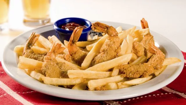 “Light my Fire”, papas fritas y langostinos empanizados