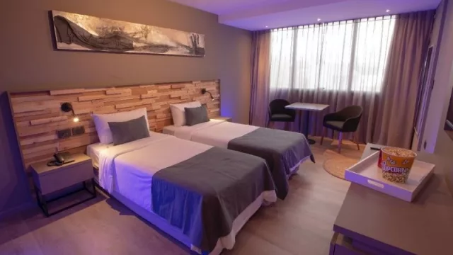 Habitación de Ñú Posta Urbana.